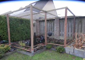 PE geknoopte netten op rol 26x26 mm, draaddikte 1,3 mm. Cees Van Uden